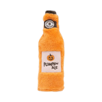 Bouteille orange à étiquette citrouille et bouchon noir