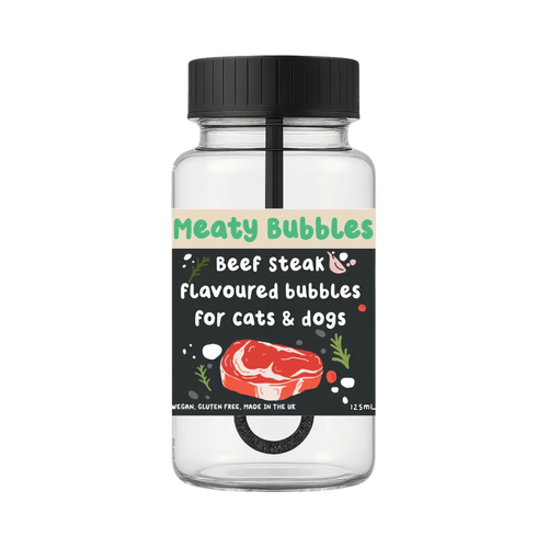 Flacon Meaty Bubbles à étiquette noire illustrée d'un steak