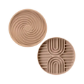 Deux disques beige, spirale et arcs