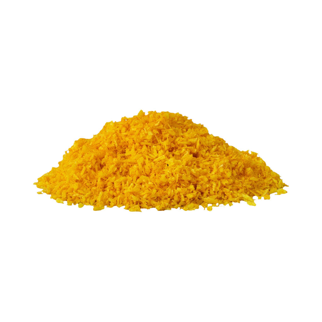 Petit tas de paillettes jaune curcuma