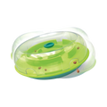 Disque vert basculant sous dôme transparent avec croquettes
