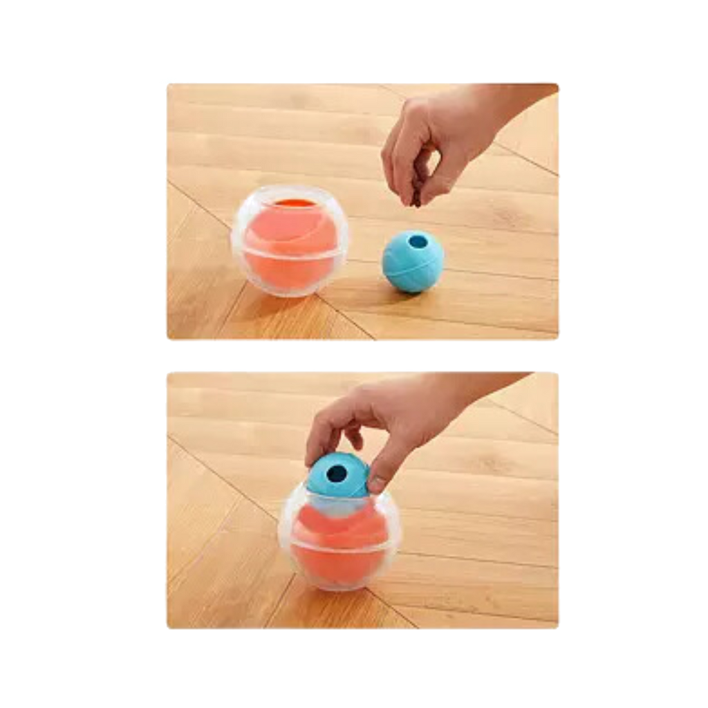 Mains qui garnissent la balle Rumble de croquettes puis la placent dans sa sphère