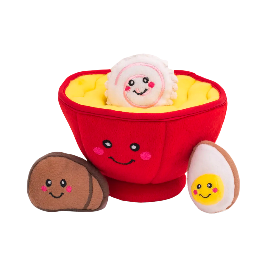 Bol rouge vu de face, œuf et champignon à ses côtés