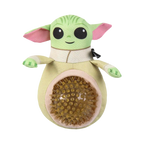 Peluche verte aux grandes oreilles avec balle à picots dans le ventre