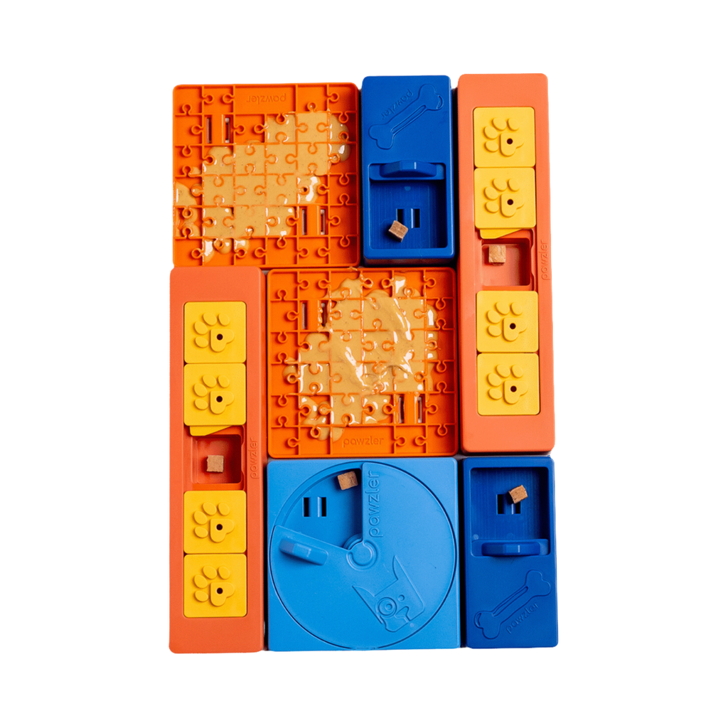 Plateau modulable orange, jaune et bleu garni de friandises