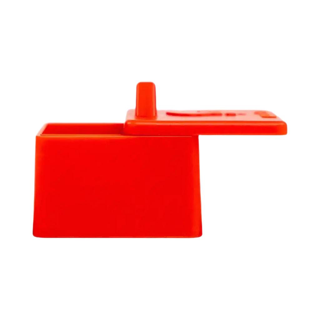 Vue de profil du bloc rouge et de son couvercle