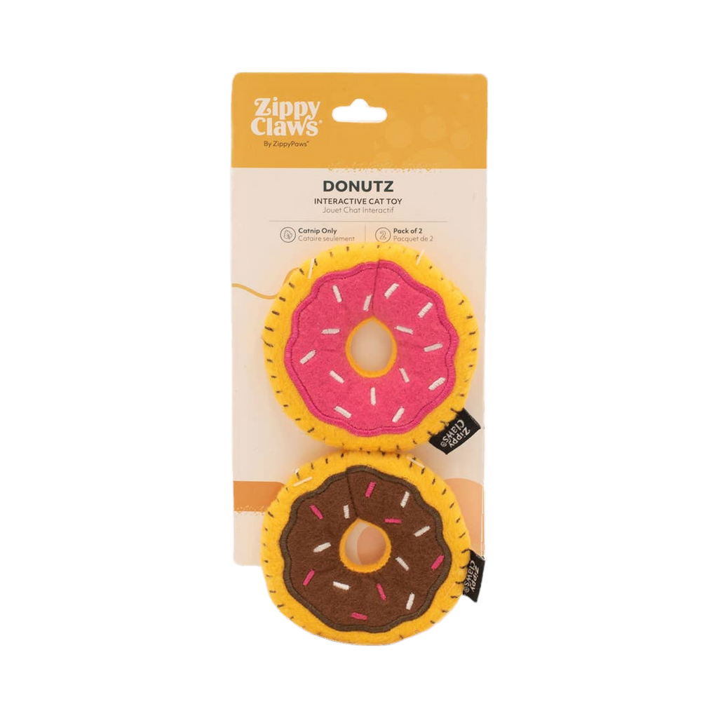 Duo de beignets rose et chocolat dans leur emballage carton