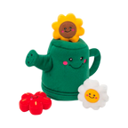 Arrosoir vert souriant avec tournesol, marguerite et fleur rouge