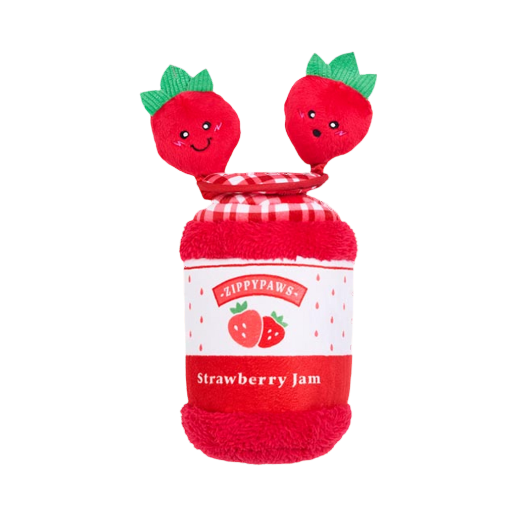 Pot couché ouvert avec deux fraises souriantes sorties