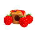 Pile de pancakes nappée avec trois fraises rouges souriantes