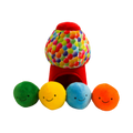 Distributeur rouge à pois multicolores et quatre boules souriantes