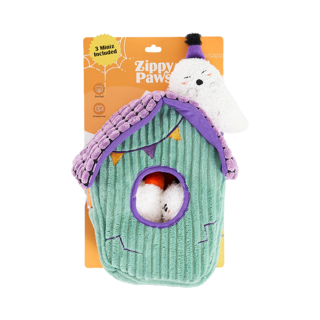 Maison hantée dans son emballage ZippyPaws, un fantôme posé sur le toit