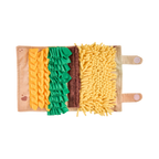 Tapis déroulé garni de friandises dans les franges