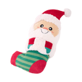 Père Noël souriant en peluche dans une chaussette rayée verte