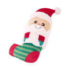 Père Noël souriant en peluche dans une chaussette rayée verte