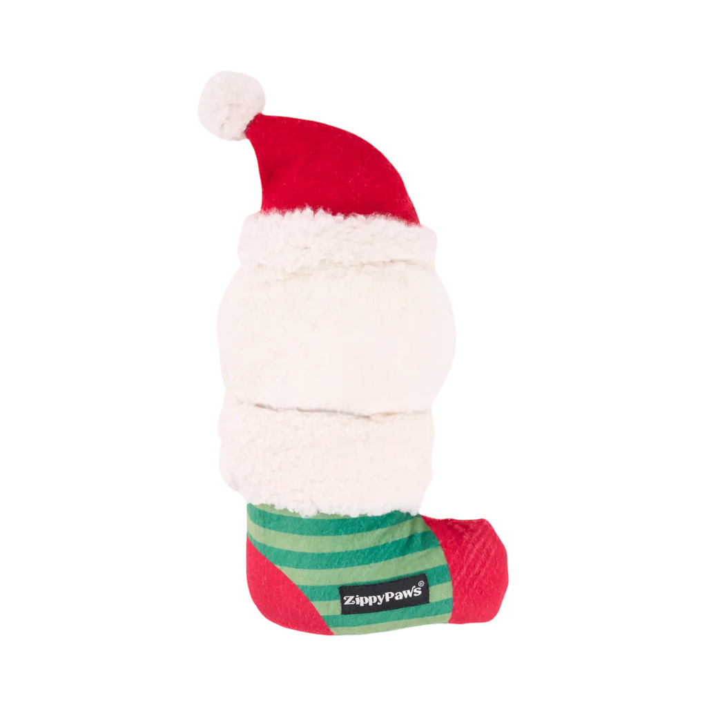 Dos du Père Noël au bonnet rouge et barbe blanche moelleuse
