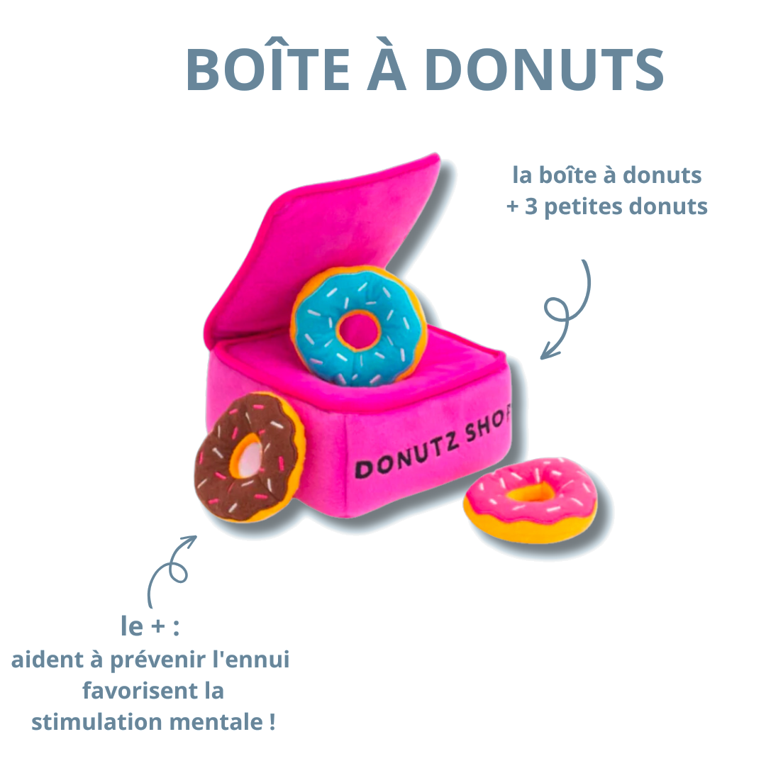 Boîte à donuts et trois donuts pour occuper le chien