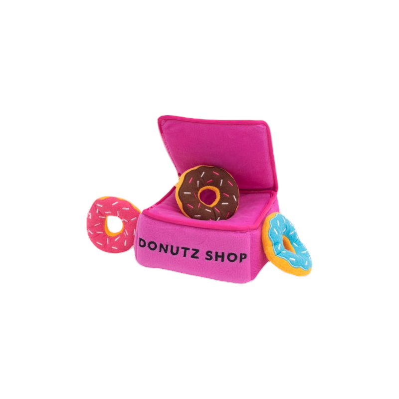 Boîte Donutz Shop rose vue en biais avec ses donuts