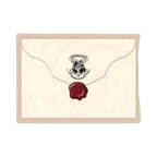 Dos de l'enveloppe avec le sceau de cire rouge de Poudlard