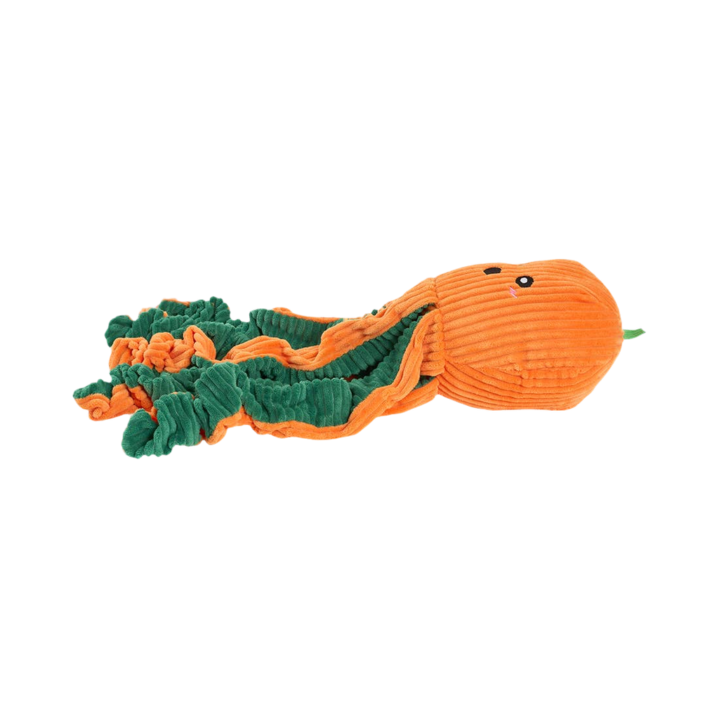 Pieuvre orange couchée de profil, tentacules repliés