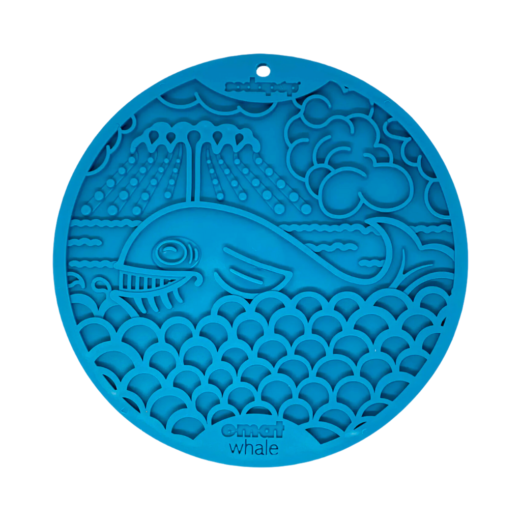 Tapis rond bleu gravé d'une baleine et de vagues