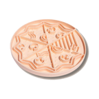 Tapis rond rose pêche découpé en parts de pizza avec reliefs
