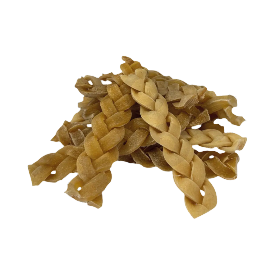 Tresses de peau de buffle séchée dorées en tas