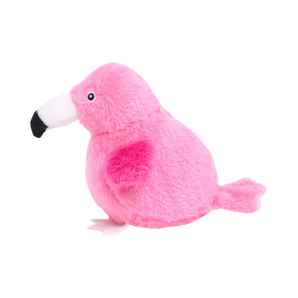 Oiseau rose de profil, ailes fuchsia repliées
