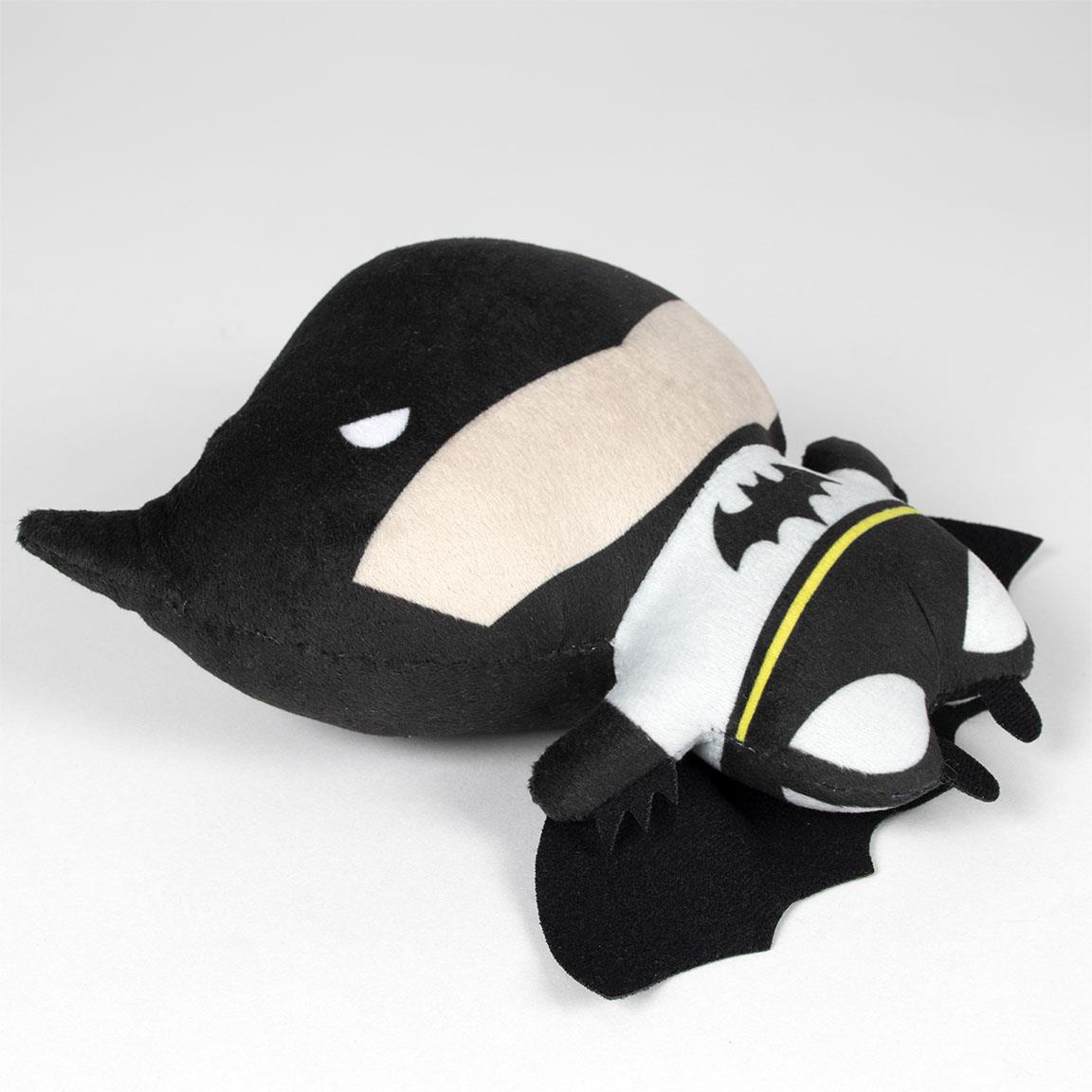 Batman couché sur le côté, vue de profil